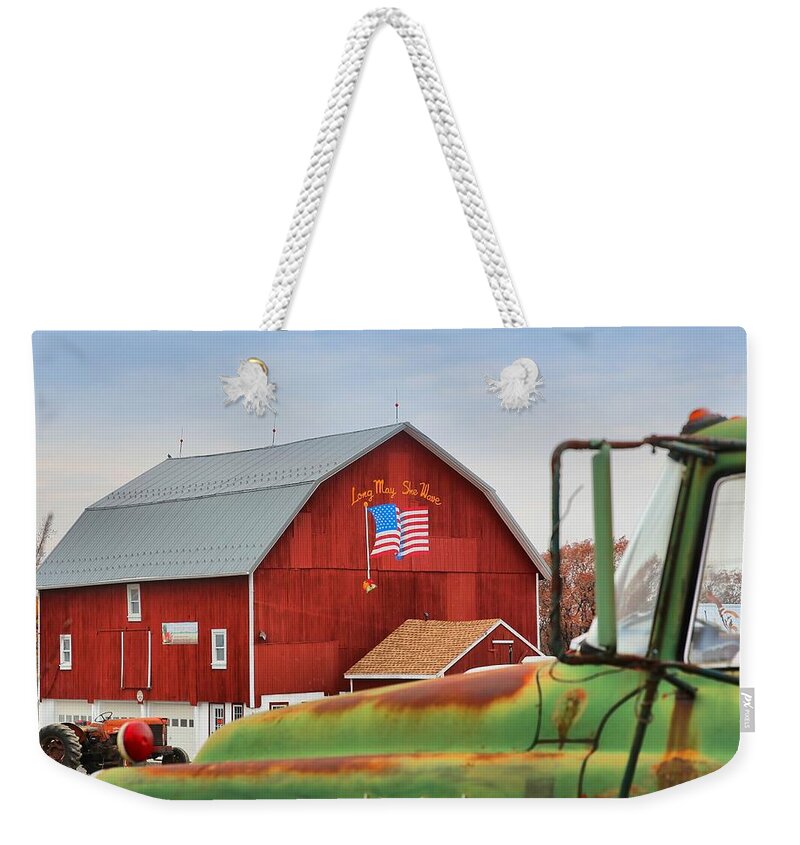 Americana Weekender Tote Bag featuring the photograph Long May She Wave by DJ Florek