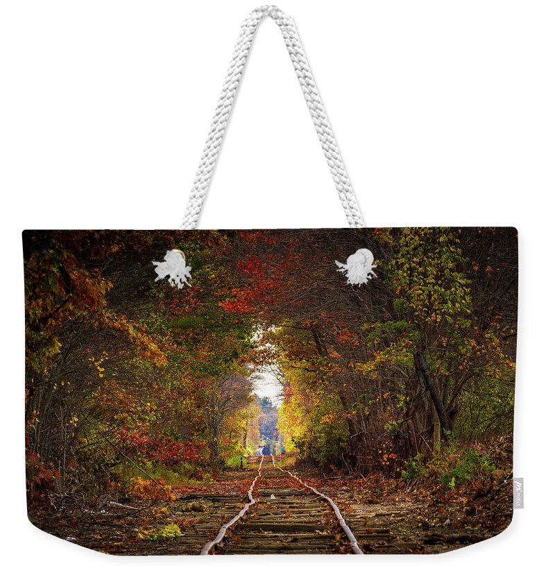 Foliage Weekender Tote Bag featuring the photograph Looking down the tracks by Darryl Hendricks