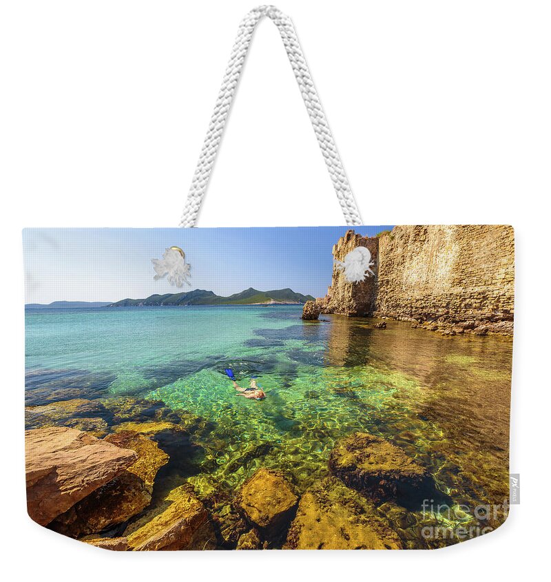 Woman Snorkeling Weekender Tote Bag featuring the photograph Looking For Fishes by Benny Marty