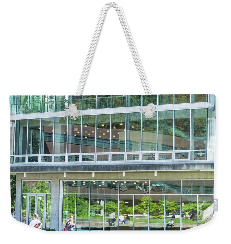 Glass Wall Weekender Tote Bag featuring the photograph Looking Out, Looking In by Tom Cochran