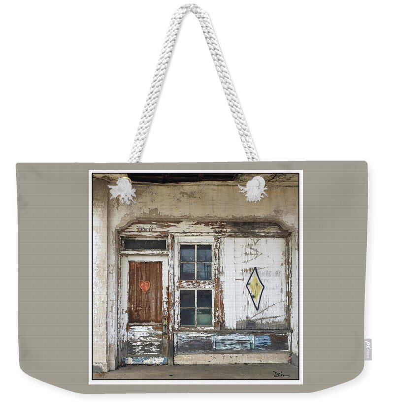 Old Gas Station Weekender Tote Bag featuring the photograph Lovingly Abandoned by Peggy Dietz