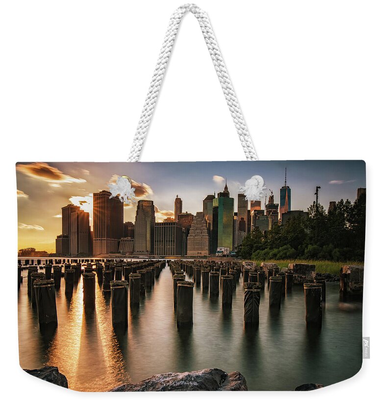 New York City Weekender Tote Bag featuring the photograph Lower Manhattan Sunset Twinkle by Alissa Beth Photography