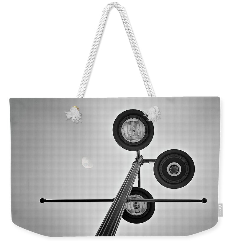 Light Weekender Tote Bag featuring the photograph Lunar Lamp in Black and White by Tom Mc Nemar