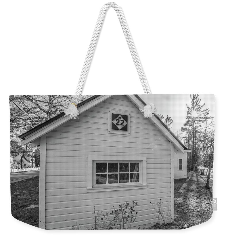 Black And White Weekender Tote Bag featuring the photograph M22 shed by John McGraw