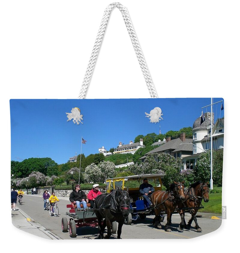 Mackinac Island Weekender Tote Bag featuring the photograph Mackinac Island at Lilac Time by Keith Stokes