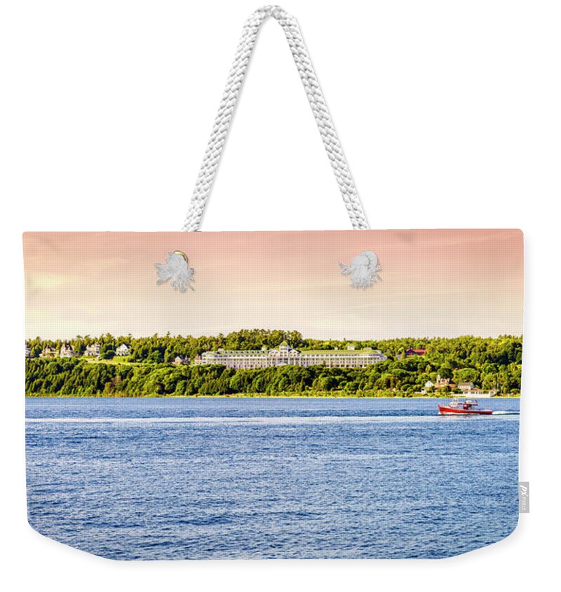 America Weekender Tote Bag featuring the photograph Mackinac Island Grand Hotel by Alexey Stiop