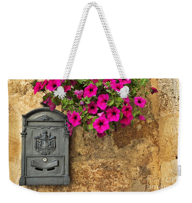 Mailbox Weekender Tote Bag featuring the photograph Mailbox with petunias by Silvia Ganora