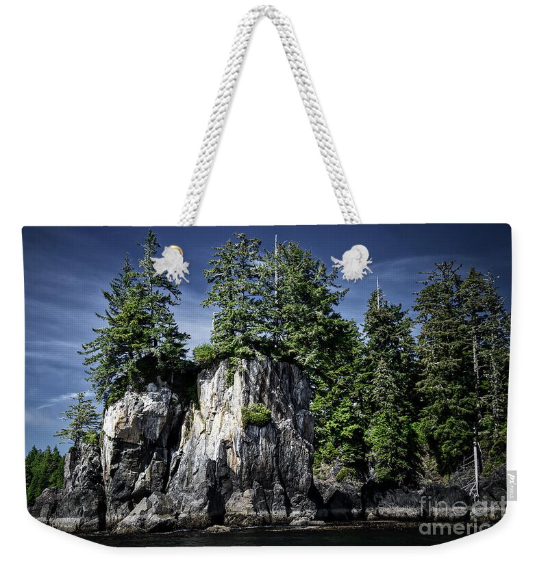  Weekender Tote Bag featuring the photograph Majestic rocks and trees in Ucluelet, British Columbia by Bruce Block