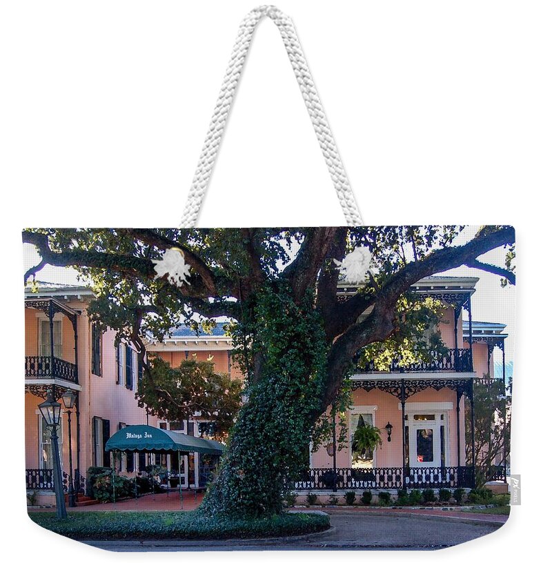 Mobile Weekender Tote Bag featuring the photograph Malaga Inn Tree by Michael Thomas