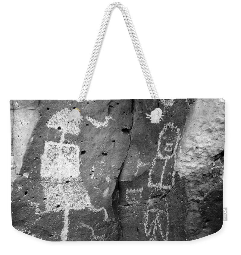 Petroglyphs Weekender Tote Bag featuring the photograph Man and Woman b/w by Glory Ann Penington