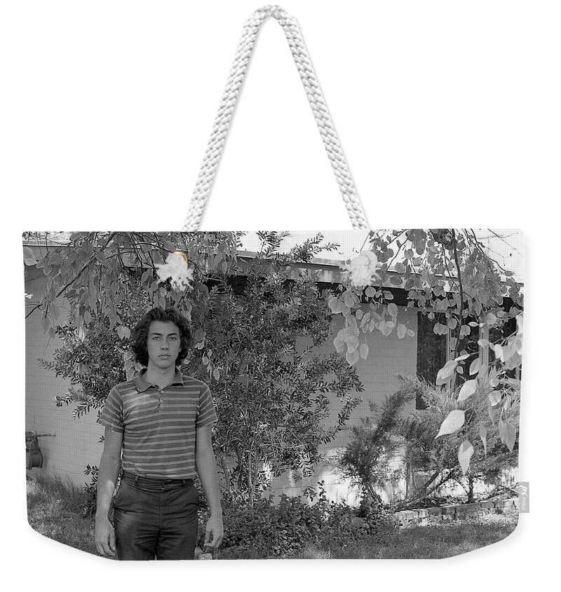 Phoenix Weekender Tote Bag featuring the photograph Man in Front of Cinder-block Home, 1973 by Jeremy Butler