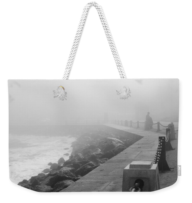 Bonnie Follett Weekender Tote Bag featuring the photograph Man Waiting in Fog by Bonnie Follett