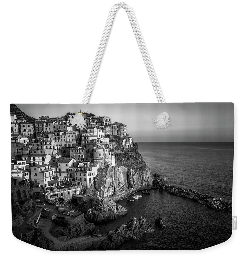 Joan Carroll Weekender Tote Bag featuring the photograph Manarola Dusk Cinque Terre Italy BW by Joan Carroll