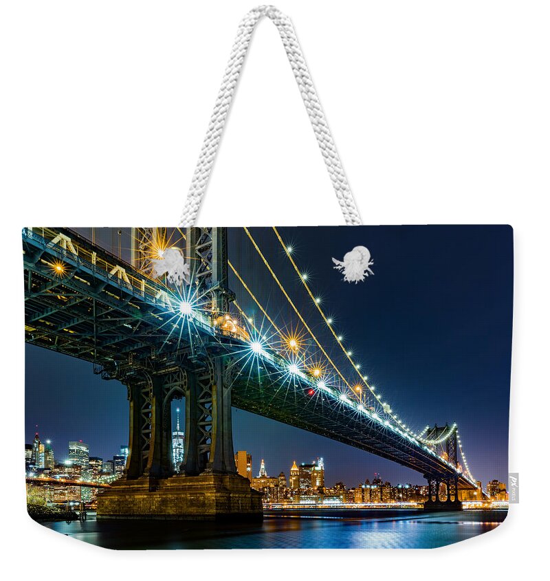 America Weekender Tote Bag featuring the photograph Manhattan Bridge framing Freedom Tower by Mihai Andritoiu