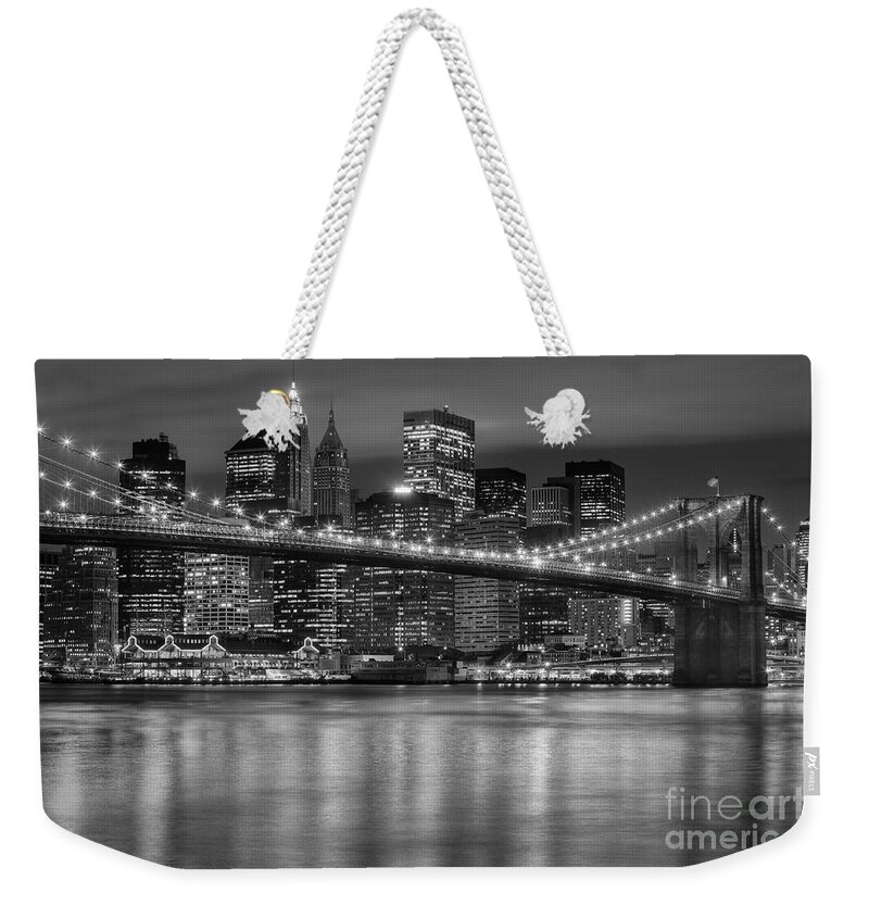 Clarence Holmes Weekender Tote Bag featuring the photograph Manhattan Night Skyline IV by Clarence Holmes