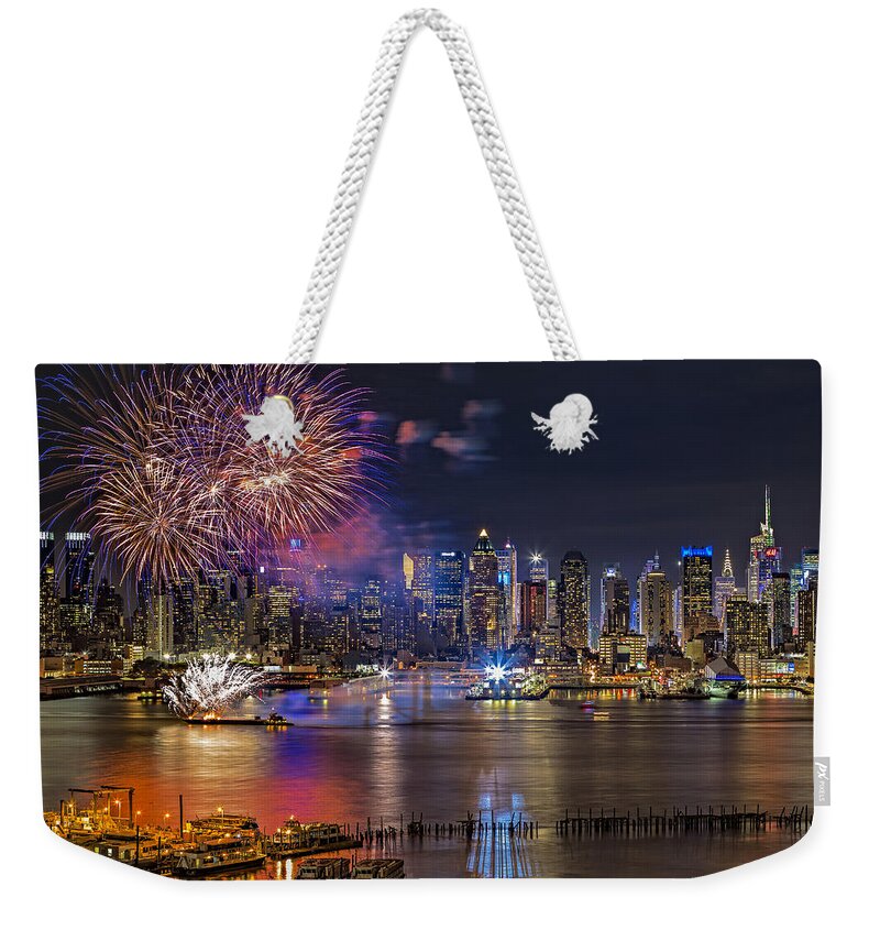 Fireworks Weekender Tote Bag featuring the photograph Manhattan NYC Summer Fireworks by Susan Candelario