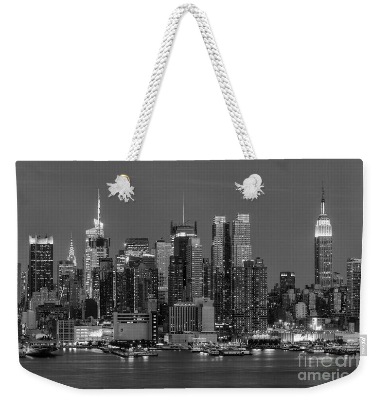 Clarence Holmes Weekender Tote Bag featuring the photograph Manhattan Twilight IV by Clarence Holmes