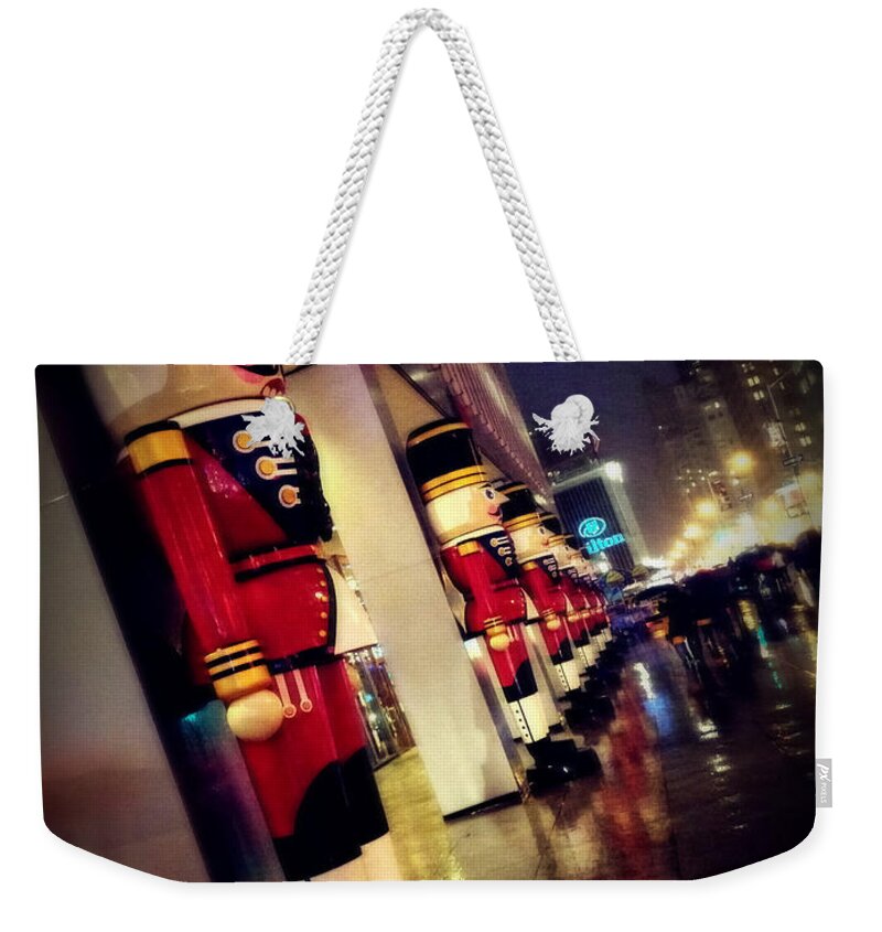 Nyc Weekender Tote Bag featuring the photograph March of the Wooden Soldiers by Eleanor Abramson