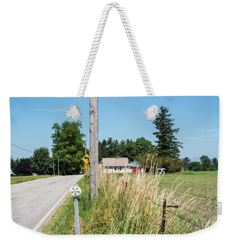 Markers Turn Blue Weekender Tote Bag featuring the photograph Markers Turn Blue by Tom Cochran