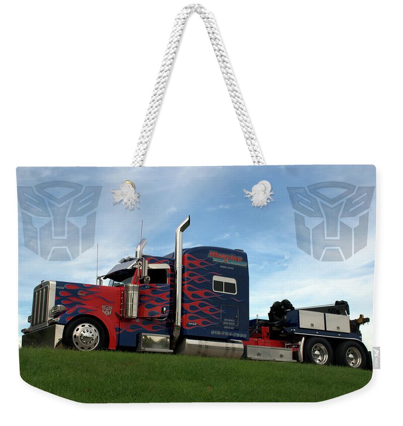 Marvins Weekender Tote Bag featuring the photograph Transformers Optimus Prime Tow Truck #1 by Tim McCullough