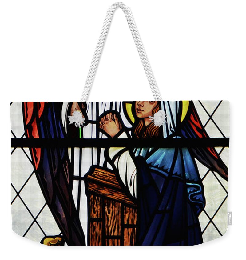 Mary Weekender Tote Bag featuring the photograph Mary and the Angel Gabriel by Debby Pueschel