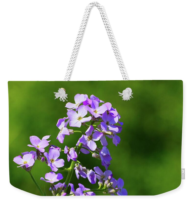 Nature Weekender Tote Bag featuring the photograph Mauve Flowers by Lyle Crump