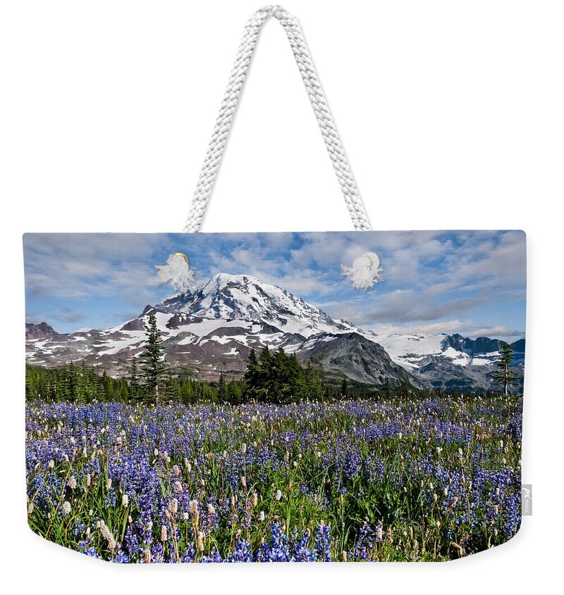 Alpine Weekender Tote Bag featuring the photograph Meadow of Lupine Near Mount Rainier by Jeff Goulden