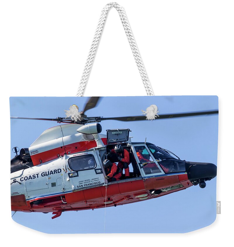 Helicopter Weekender Tote Bag featuring the photograph MH-65 Hoist by Rick Pisio