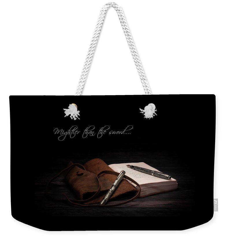 Parker Weekender Tote Bag featuring the photograph Mightier Than The Sword by Tom Mc Nemar