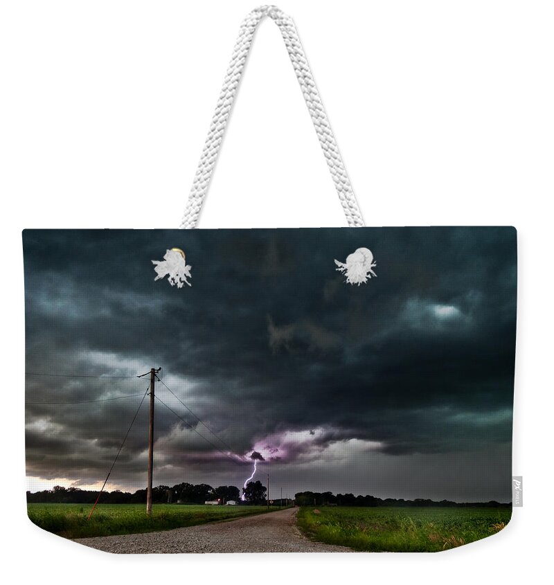 Lightning Weekender Tote Bag featuring the photograph Mikey's Lightning by Eric Benjamin