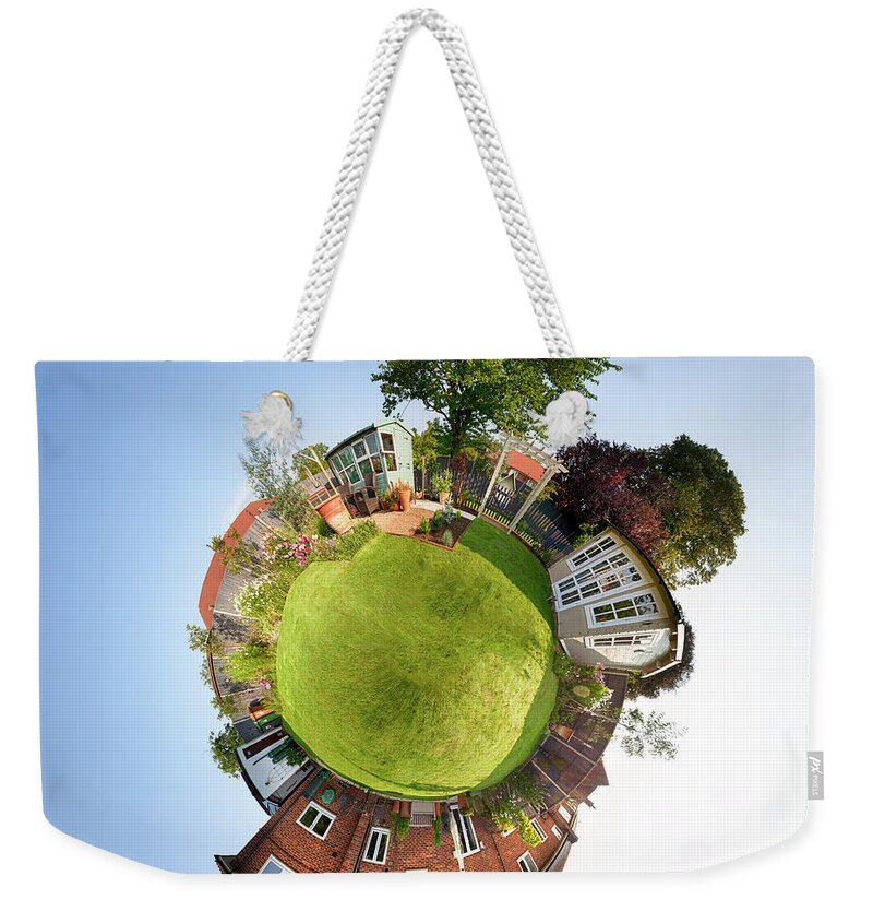 Mini Weekender Tote Bag featuring the photograph Mini planet concept home and garden by Simon Bratt