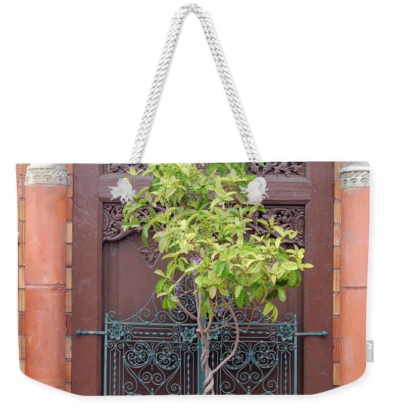 Mission Inn Weekender Tote Bag featuring the photograph Mission Inn Doorway by Amy Fose