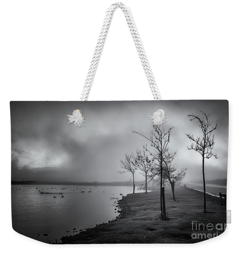 Dslr Weekender Tote Bag featuring the photograph Mist over the tarn - monochrome by Mariusz Talarek