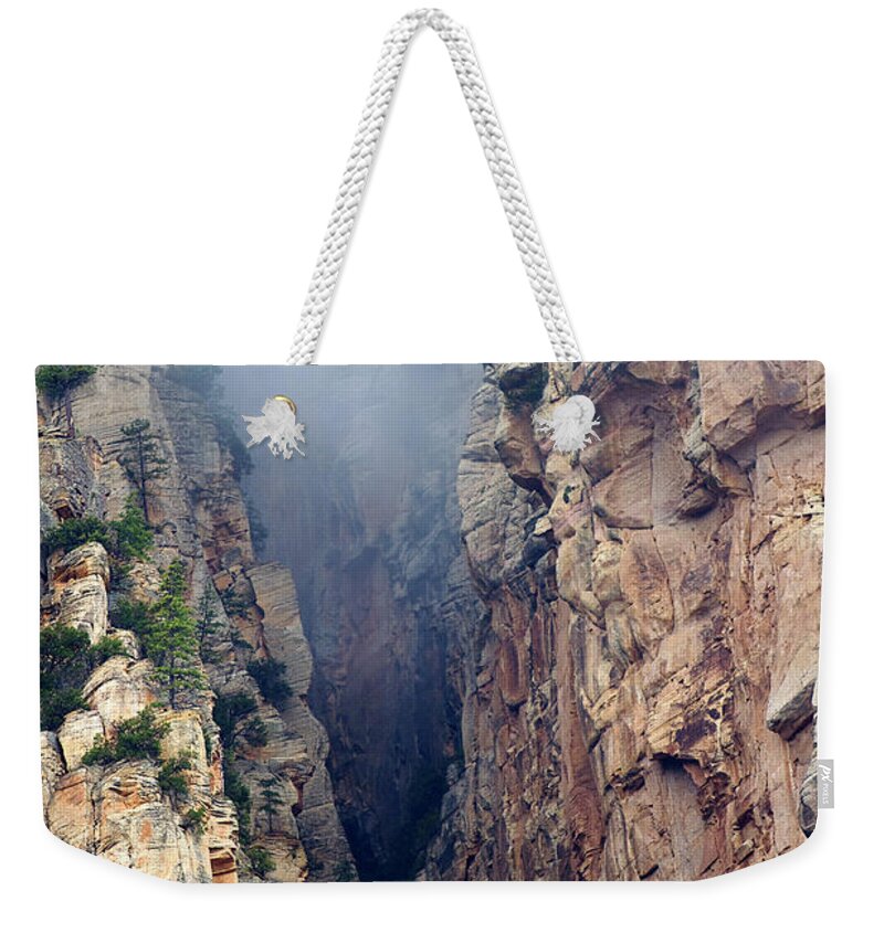 Red Rocks Weekender Tote Bag featuring the photograph Misty Canyons by Phyllis Denton