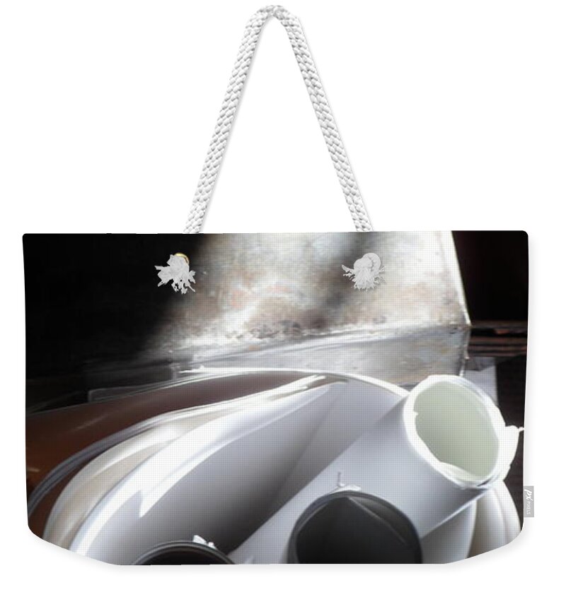 B & W Circles Paper Frozen Time Weekender Tote Bag featuring the photograph Moment in time by J Doyne Miller