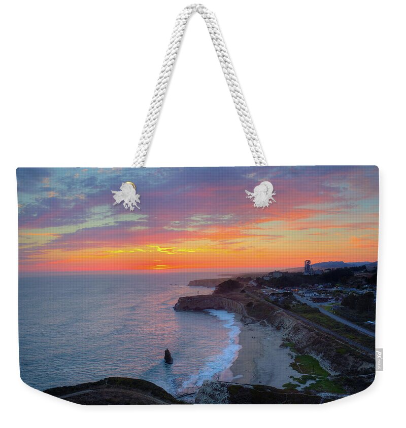 Above Weekender Tote Bag featuring the photograph Monsoonal Sunset by David Levy