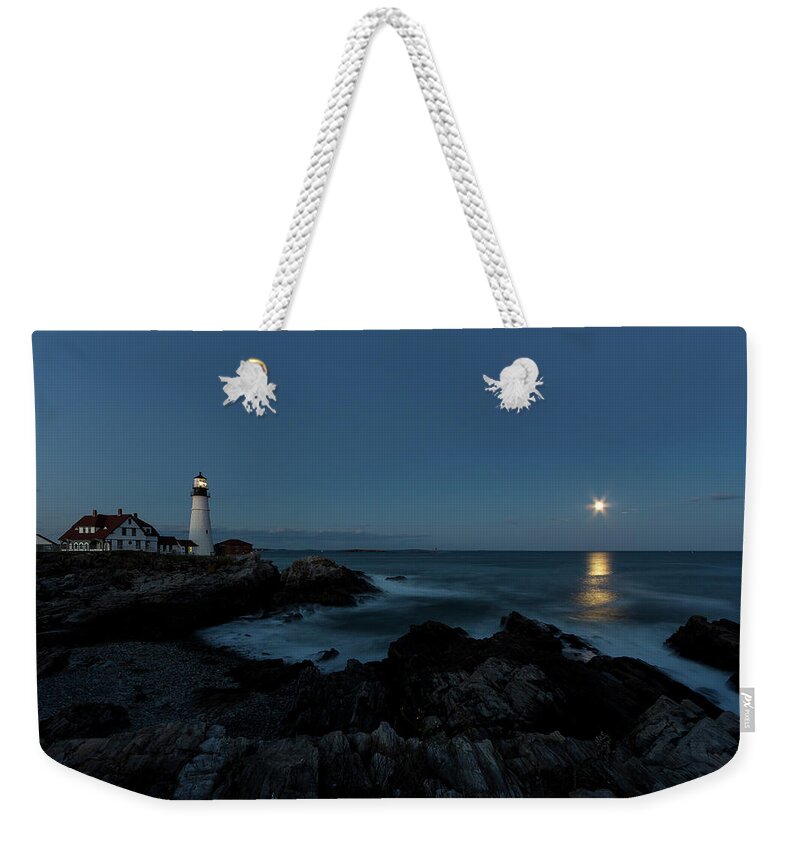 Moon Weekender Tote Bag featuring the photograph Moon Rise at Portland Headlight by Darryl Hendricks