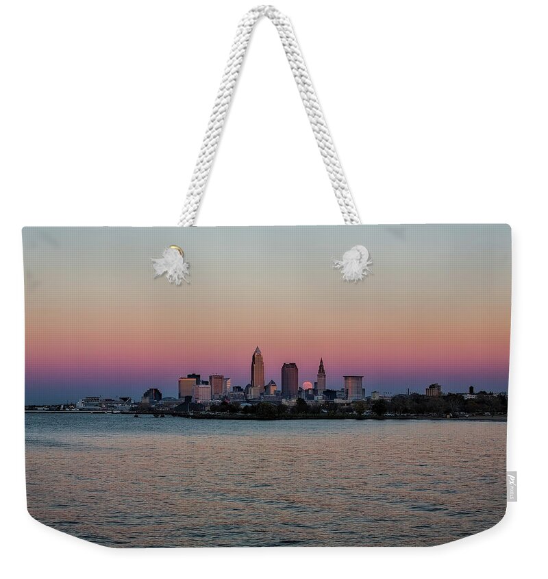 Moon Rise Over Cleveland Weekender Tote Bag featuring the photograph Moon Rise Over Cleveland by Jackie Sajewski