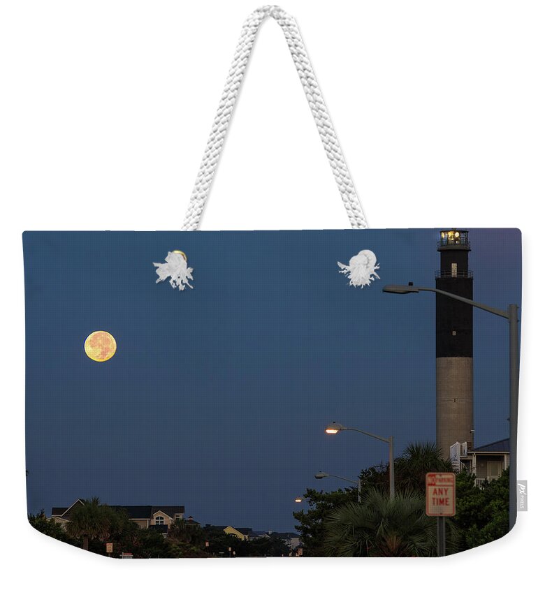 Moon Weekender Tote Bag featuring the photograph Moonlight Lighthouse by Nick Noble