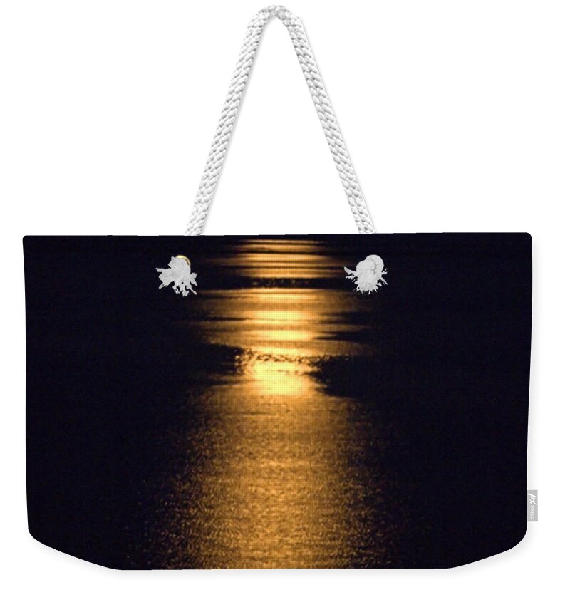 Moonstruck Weekender Tote Bag featuring the photograph Moonstruck by Newwwman