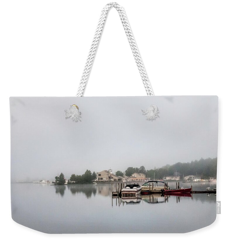 Morning Mist On The Lake Weekender Tote Bag featuring the photograph Morning Mist on the Lake by Phyllis Taylor