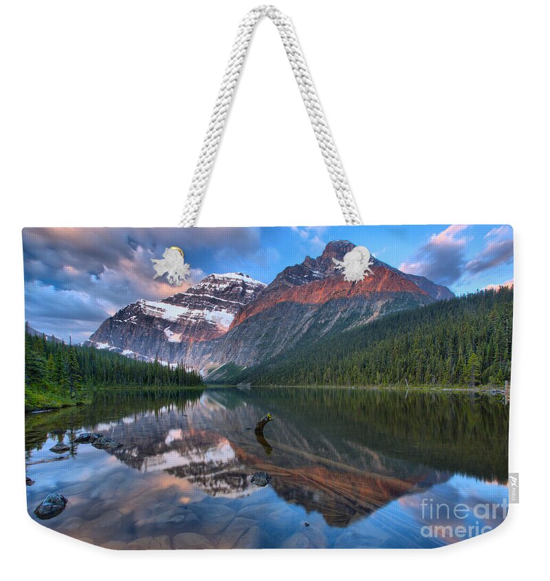  Weekender Tote Bag featuring the photograph Morning Reflections In Cavell Pond by Adam Jewell