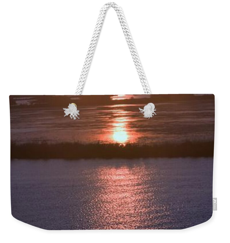 Orange Weekender Tote Bag featuring the photograph Mother Natures Mood Swings by John Glass