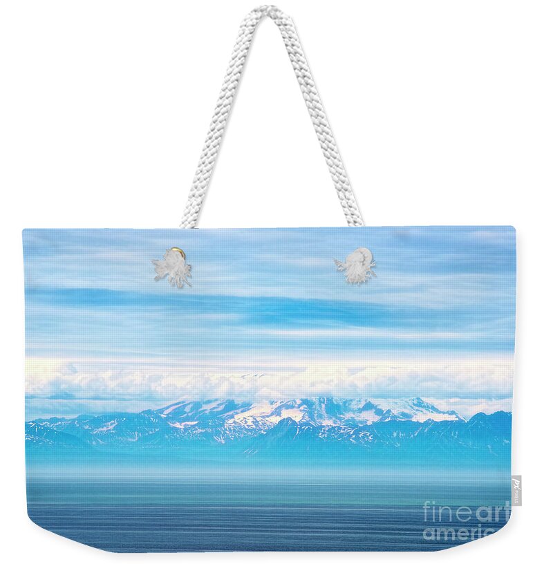 Ninilchik Alaska Weekender Tote Bag featuring the photograph Mountains Clouds and Water by David Arment