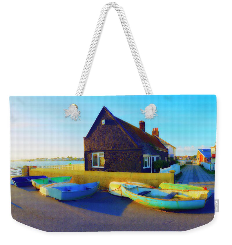 Sand Weekender Tote Bag featuring the photograph Muddage Rowers by Jan W Faul