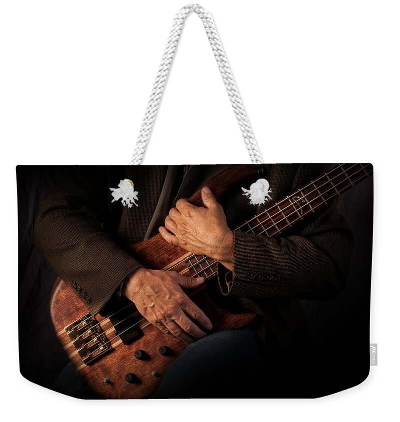 Bass Weekender Tote Bag featuring the photograph Musician's Hands by David and Carol Kelly