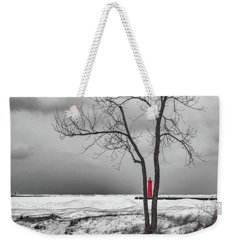 Clouds Weekender Tote Bag featuring the photograph Muskegon Lighthouse in Winter by Joe Holley