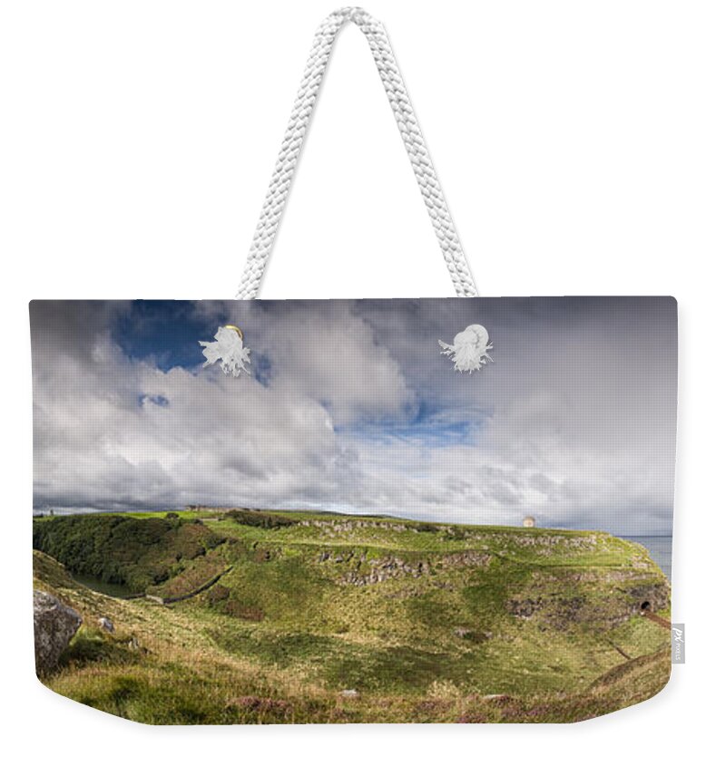 Mussenden Temple Weekender Tote Bag featuring the photograph Mussenden Temple and the Black Glen by Nigel R Bell