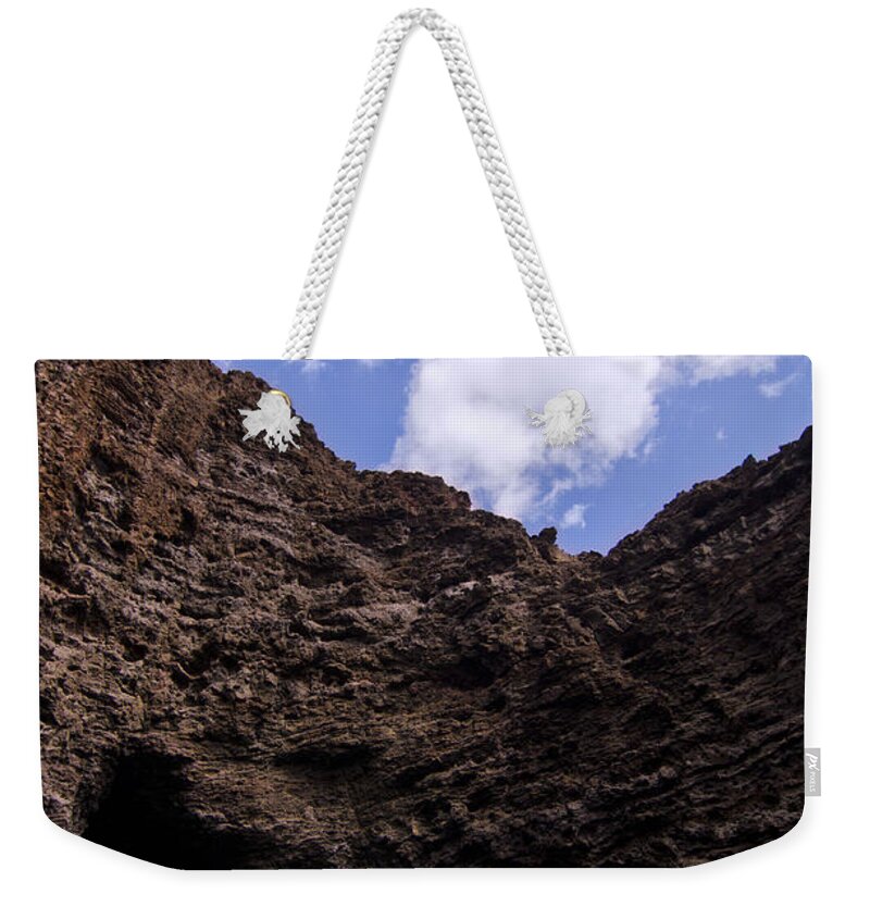 Kauai Weekender Tote Bag featuring the photograph Na Pali Coast Sea Cave by Lawrence Knutsson