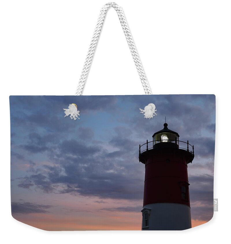 Blue Hour Weekender Tote Bag featuring the photograph Nauset Light lighthouse at sunset by Marianne Campolongo